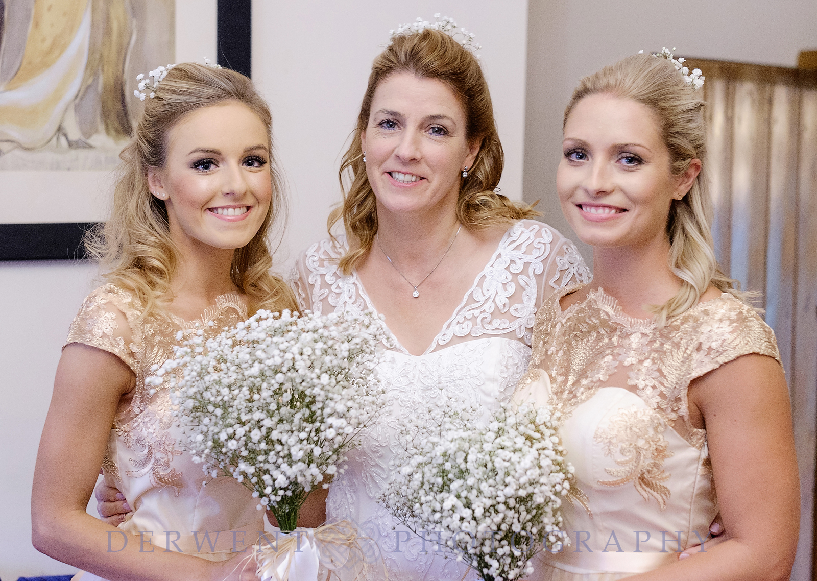 Bride posing with her bridesmaids